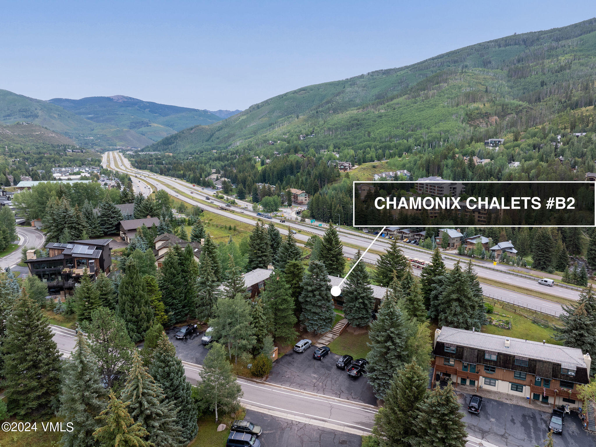 2456 Chamonix Lane, Unit B2 Vail, CO 81657 - Photo 3 of 18 a view of a street with a building in the background