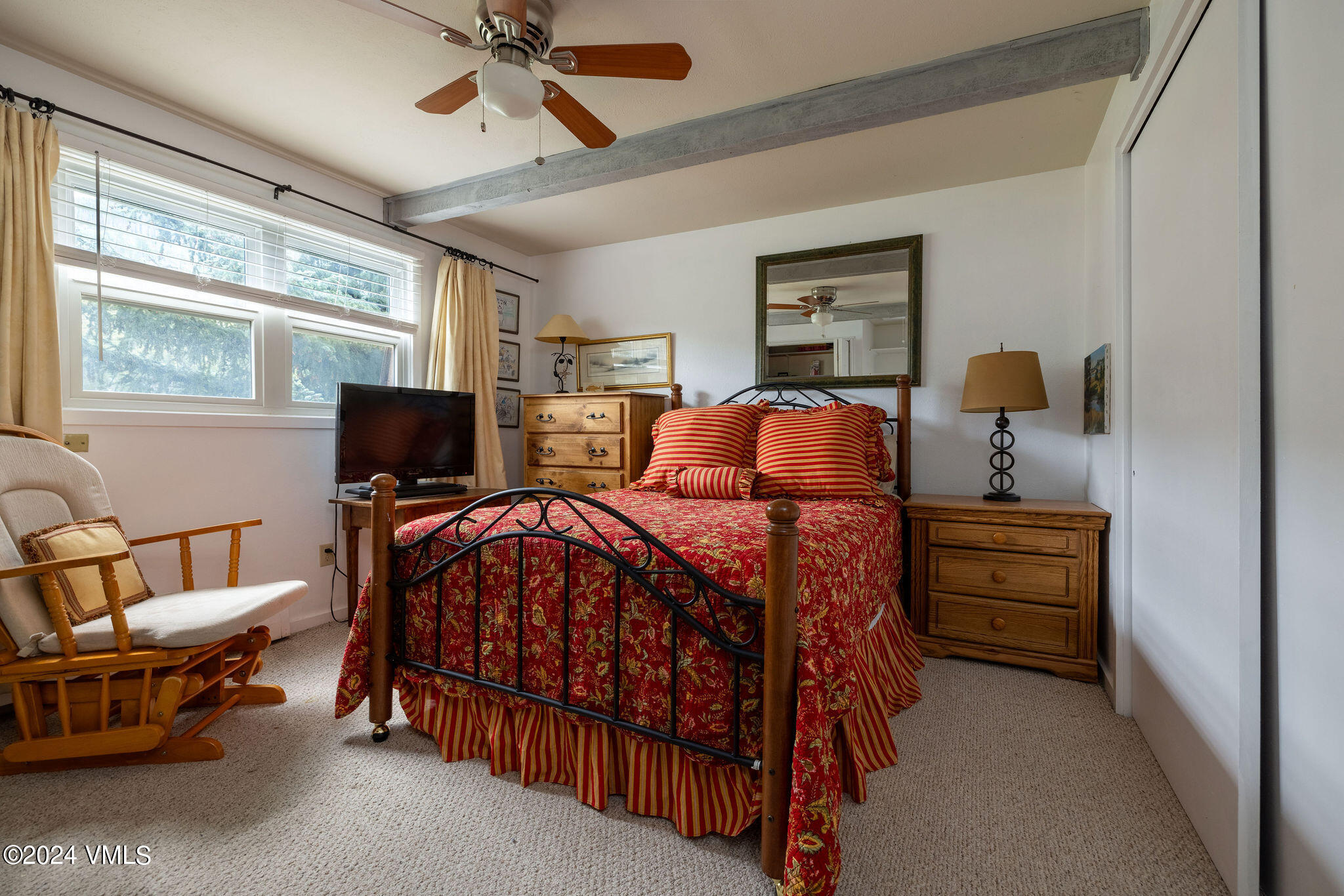 2456 Chamonix Lane, Unit B2 Vail, CO 81657 - Photo 8 of 18 a bedroom with bed and a window