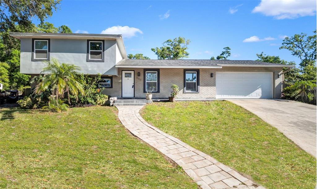 500 Hillpine Way Brandon, FL 33510 - Photo 1 of 39 a house view with a garden space