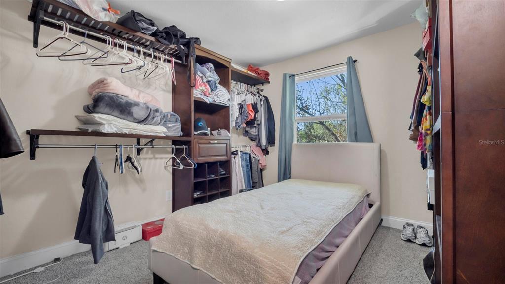 500 Hillpine Way Brandon, FL 33510 - Photo 26 of 39 a bedroom with a bed and a closet