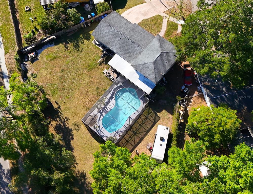 500 Hillpine Way Brandon, FL 33510 - Photo 39 of 39 an aerial view of a house with swimming pool and large trees