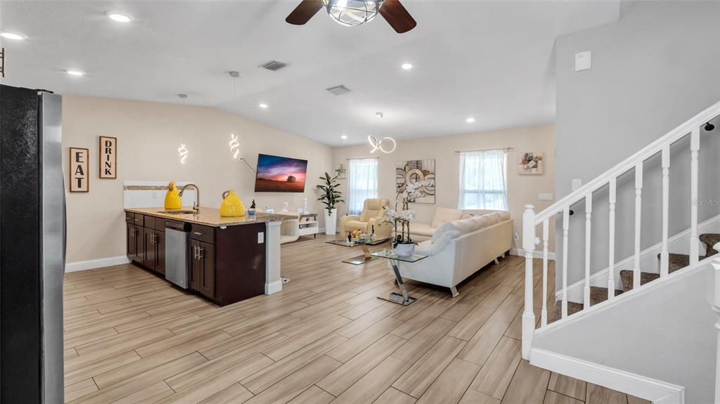 500 Hillpine Way Brandon, FL 33510 - Photo 10 of 39 a living room with furniture and a flat screen tv