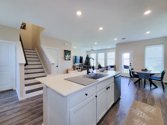 a bathroom with a sink and mirror