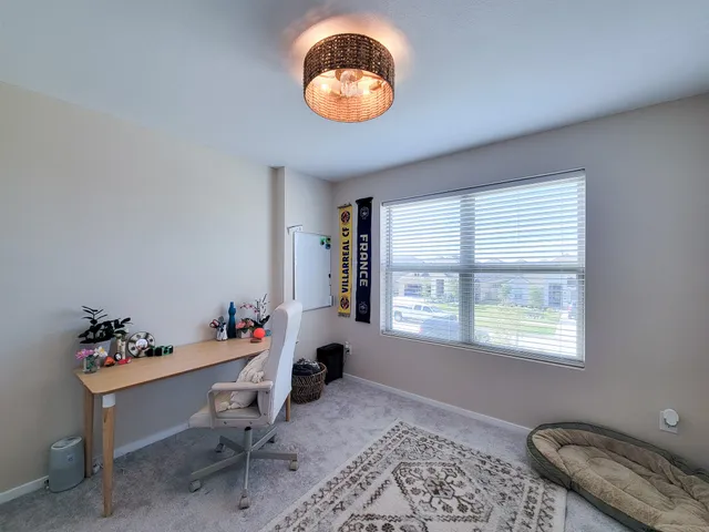 a bathroom with a sink toilet and a mirror