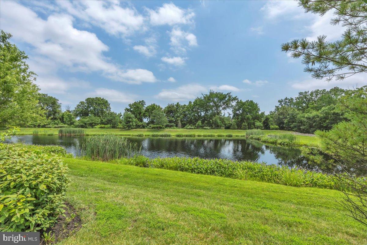 23 Montclaire Road Medford, NJ 08055 - Photo 4 of 24 Serene waters reflect a tranquil landscape.