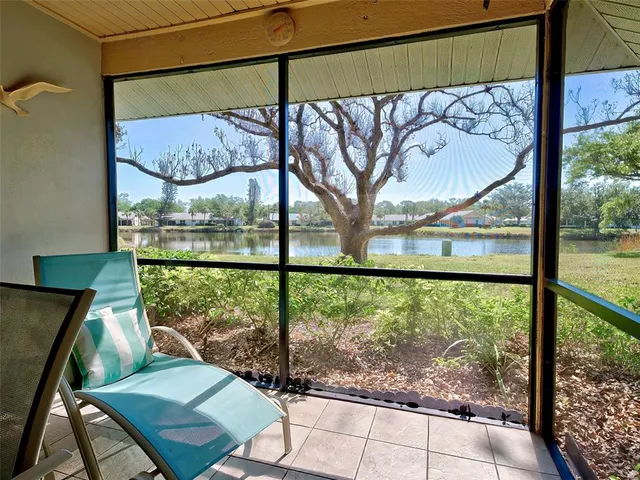 a spacious bathroom with a sink a toilet and a mirror