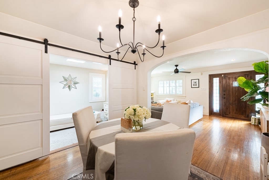 1601 Hi Point Street Los Angeles, CA 90035 - Photo 7 of 24 a view of a dining room with furniture window and wooden floor