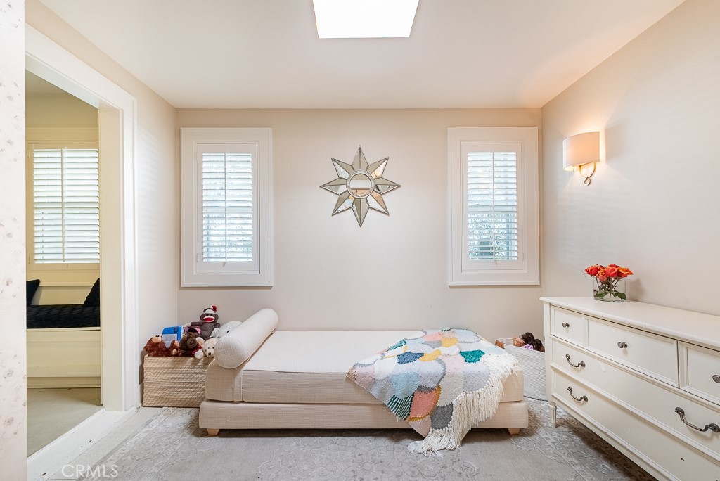 1601 Hi Point Street Los Angeles, CA 90035 - Photo 9 of 24 a bedroom with a bed and a window