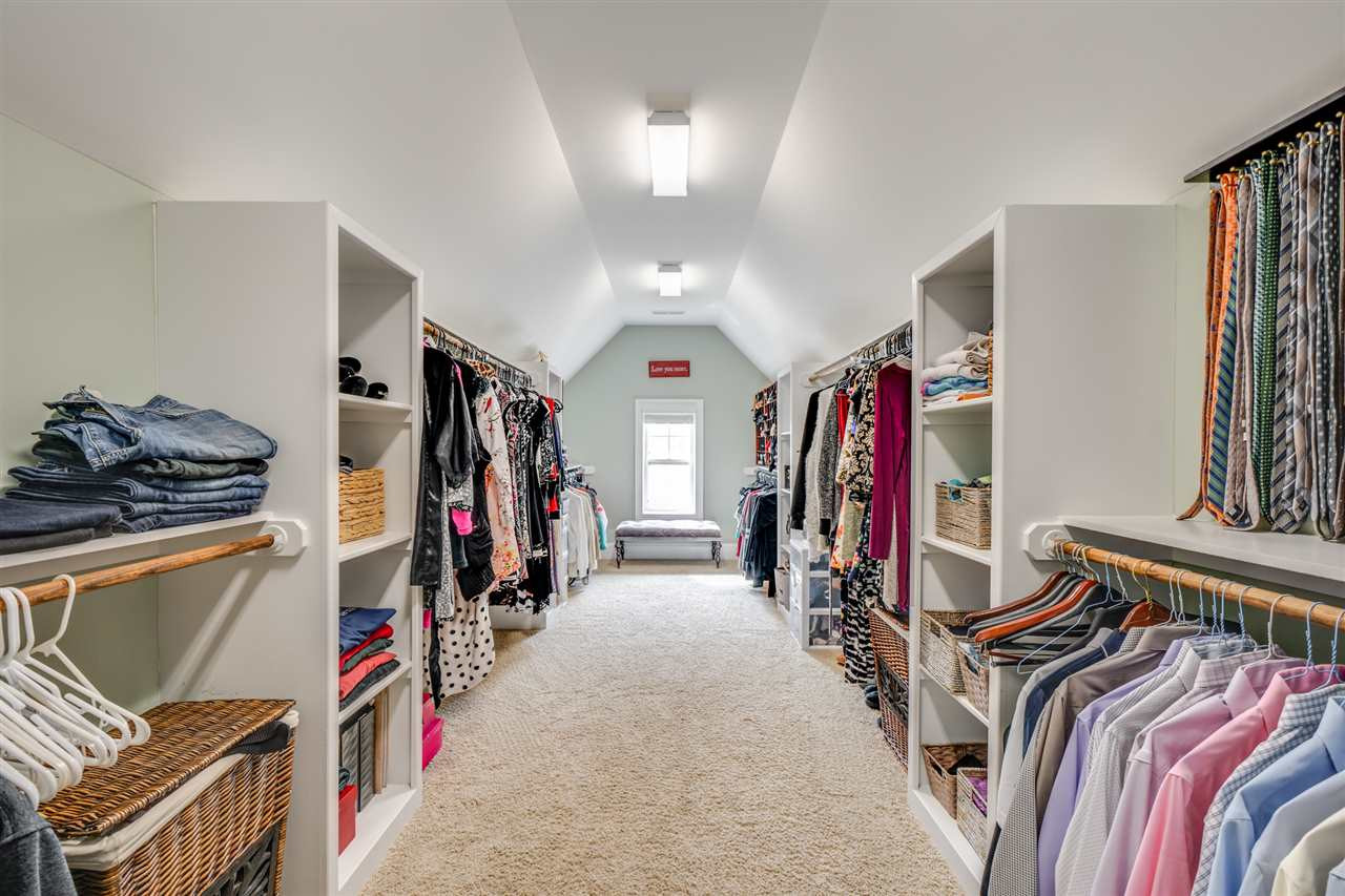 2212 Big Lake Court Raleigh, NC 27607 - Photo 18 of 30 The upstairs master walk-in closet of your dreams! Walk-in Closet