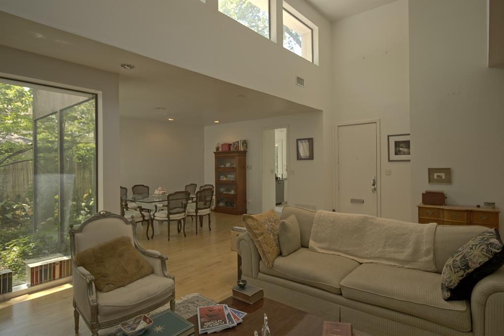 5108 Maple Springs Boulevard Dallas, TX 75235 - Photo 14 of 39 a living room with furniture and a large window