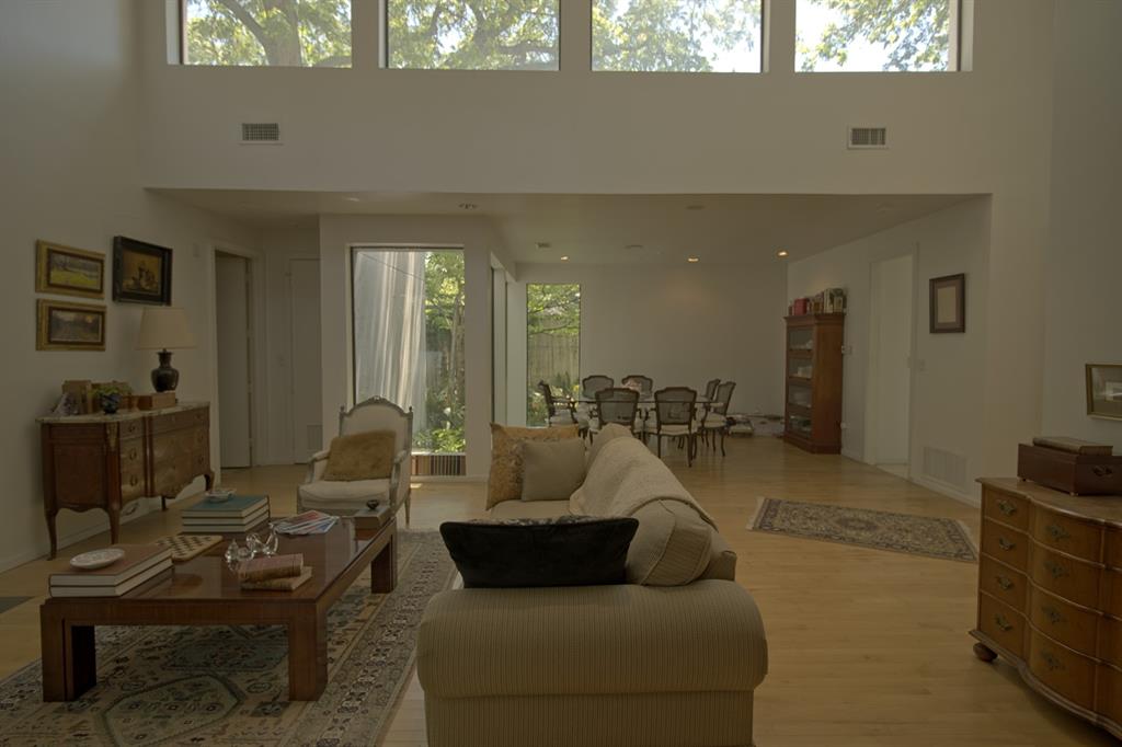 5108 Maple Springs Boulevard Dallas, TX 75235 - Photo 10 of 39 a living room with furniture and a large window
