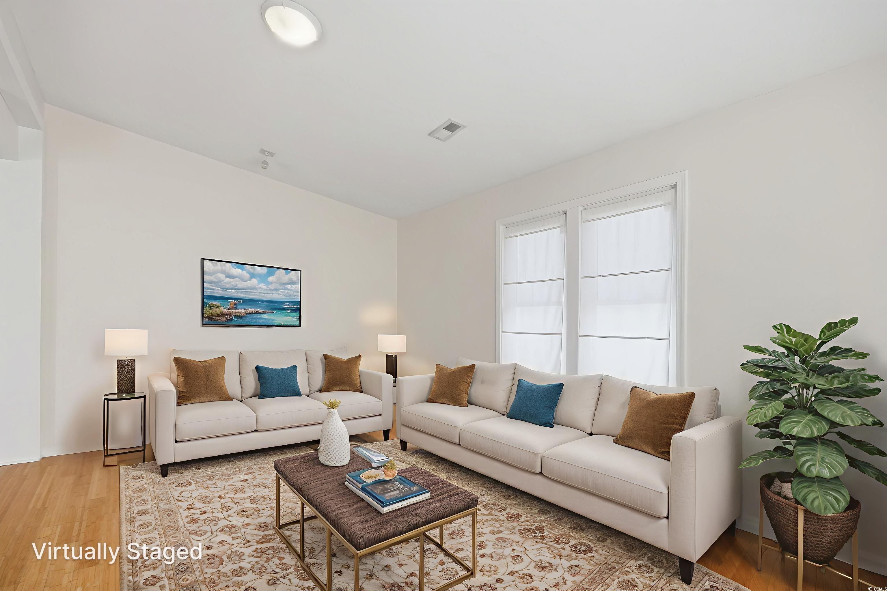 462 Bay Drive Murrells Inlet, SC 29576 - Photo 3 of 37 Living area with wood finished floors