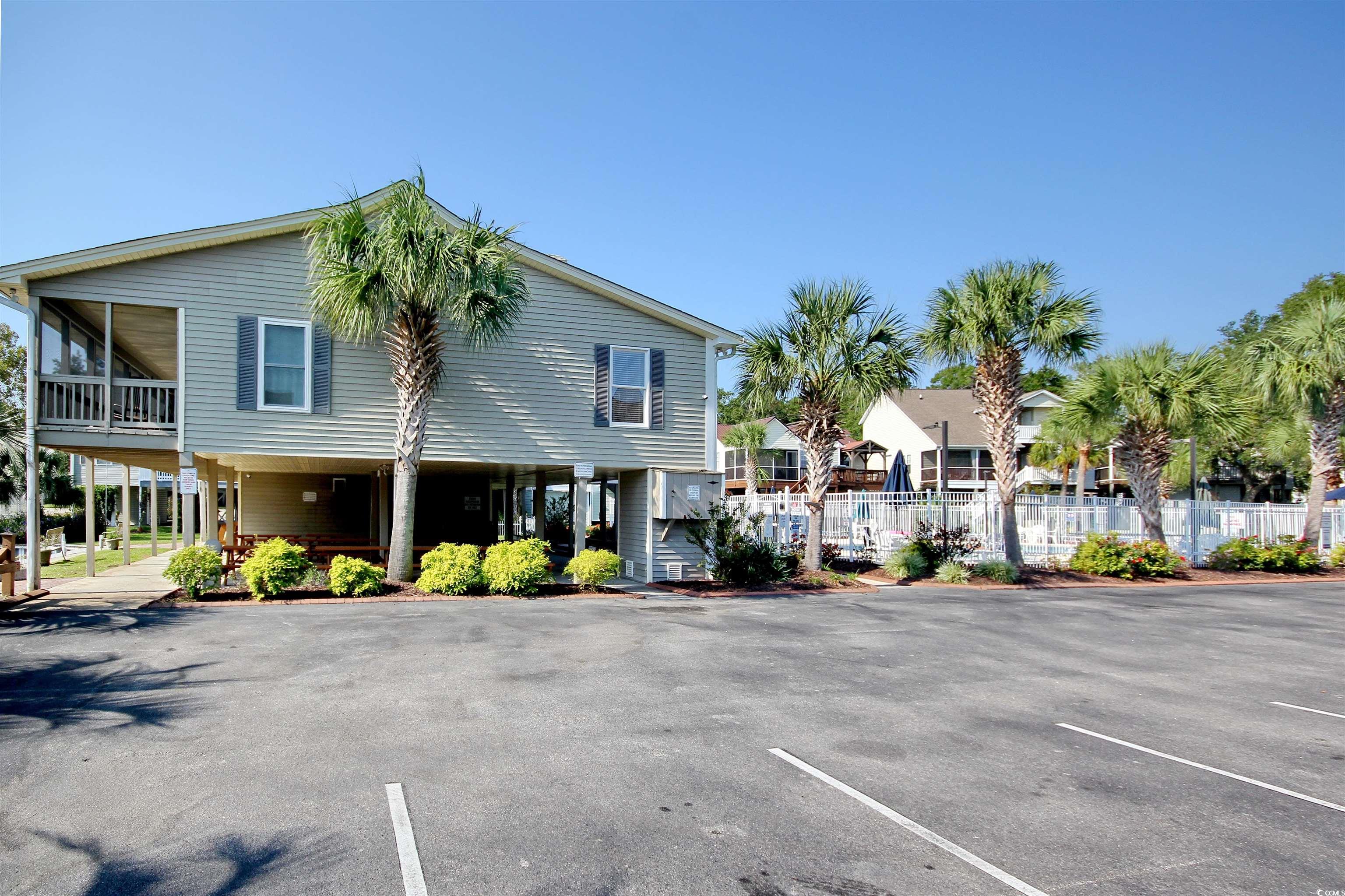 462 Bay Drive Murrells Inlet, SC 29576 - Photo 30 of 37 View of grassy yard featuring a deck