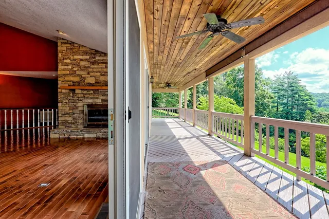 a kitchen with stainless steel appliances granite countertop wooden cabinets stove a sink and dishwasher next to a window