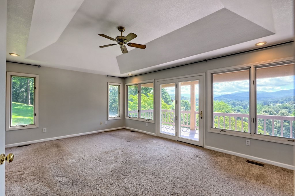 136 Elf School Road Hayesville, NC 28904 - Photo 38 of 84 a view of an empty room with a window