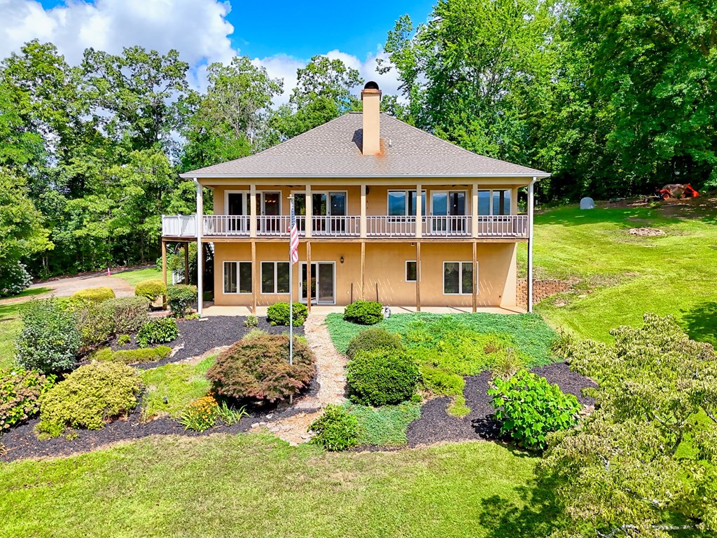136 Elf School Road Hayesville, NC 28904 - Photo 4 of 84 a front view of a house with a yard