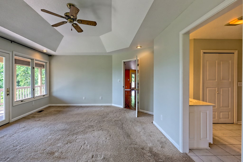 136 Elf School Road Hayesville, NC 28904 - Photo 48 of 84 wooden floor in an empty room with a window