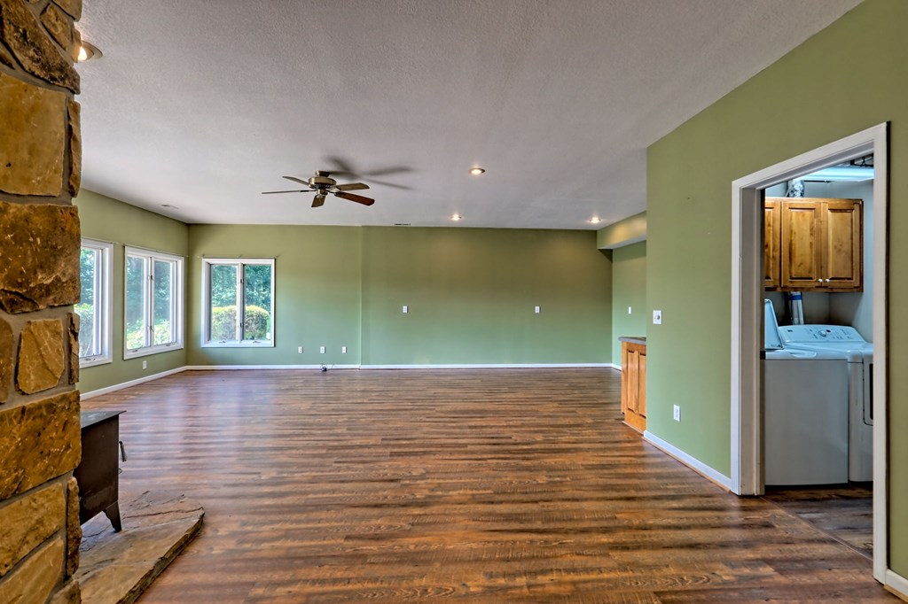 136 Elf School Road Hayesville, NC 28904 - Photo 53 of 84 a view of a room with a ceiling fan and window