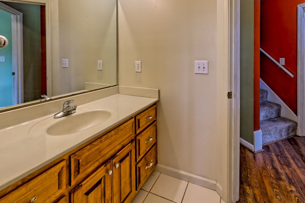 136 Elf School Road Hayesville, NC 28904 - Photo 64 of 84 a bathroom with a sink and a mirror