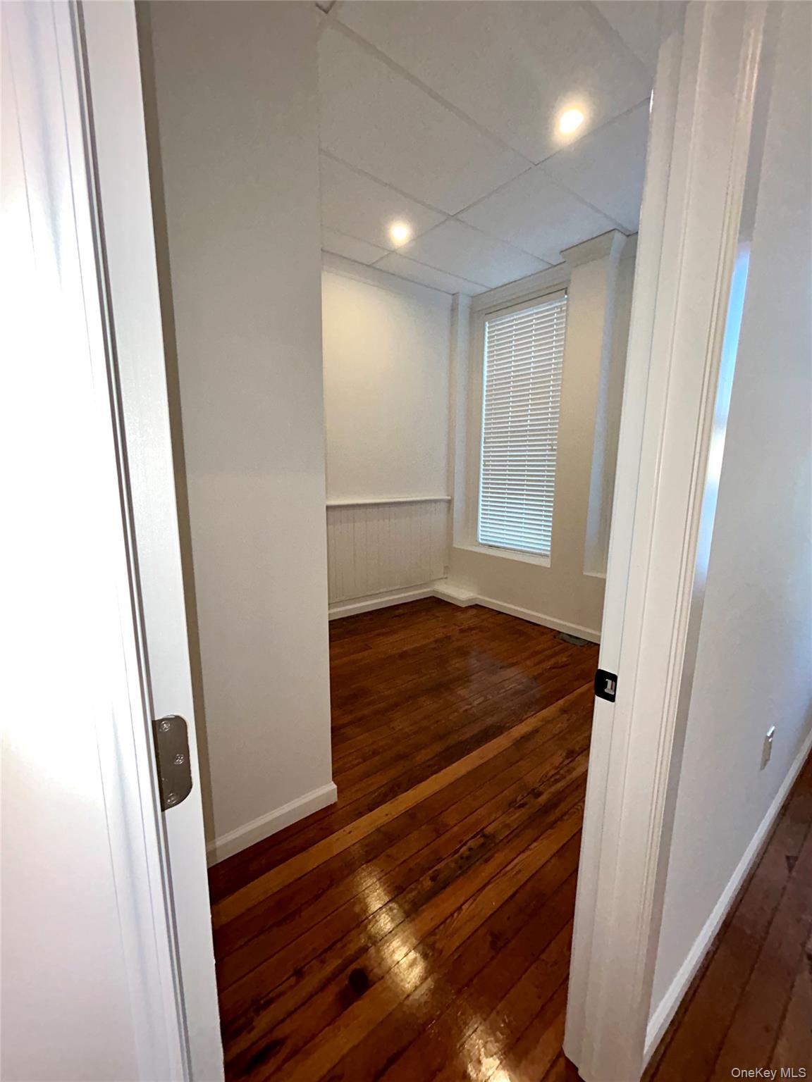 48 West Main Street Riverhead, NY 11901 - Photo 6 of 12 a view of space with wooden floor