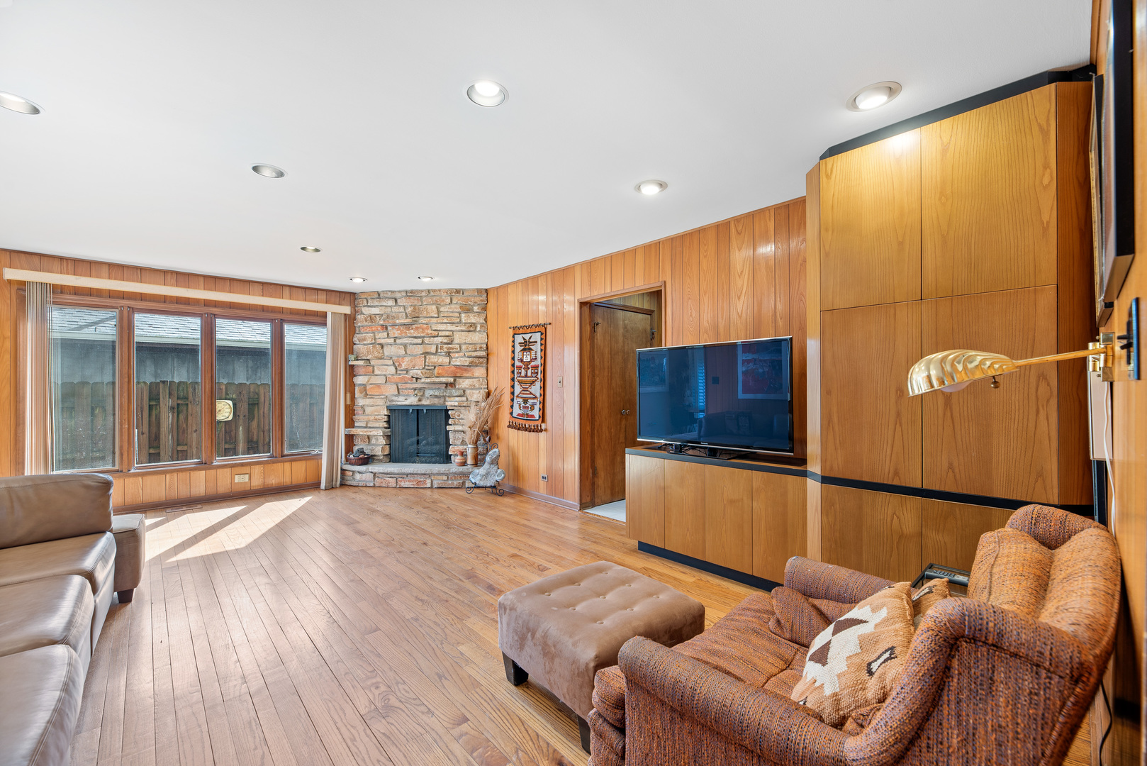 241 Ridge Road Highland Park, IL 60035 - Photo 8 of 31 a living room with furniture a large window and wooden floor