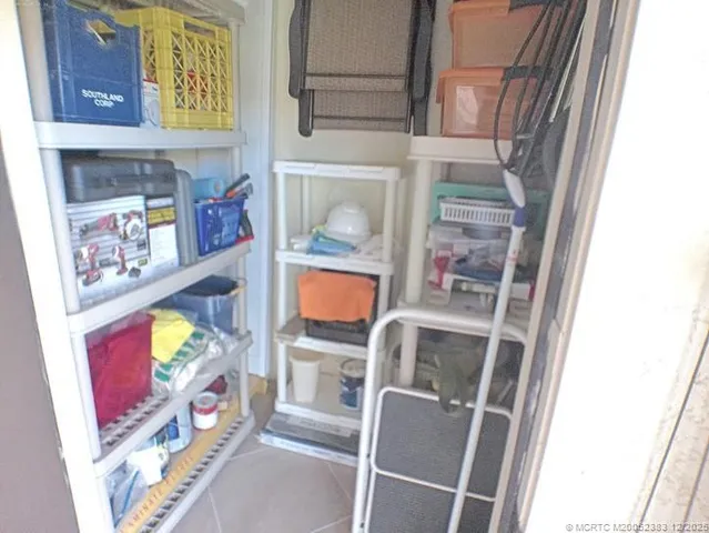 a view of a backyard with sitting area