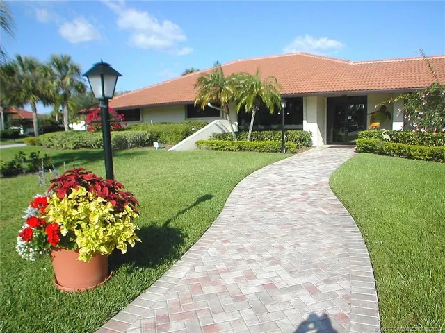 a view of a park with swings