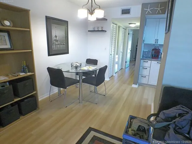 a workspace with furniture and wooden floor