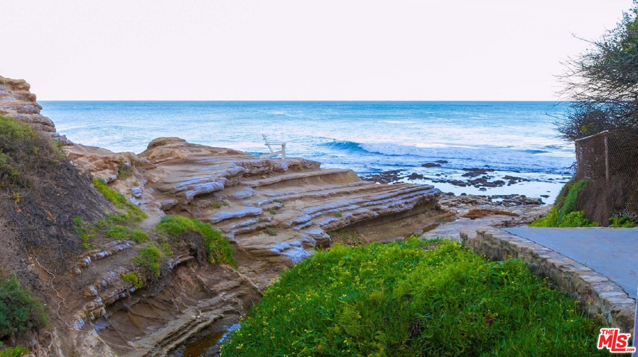 29239 Heathercliff Road, Unit 12 Malibu, CA 90265 - Photo 1 of 8 an aerial view of house with yard