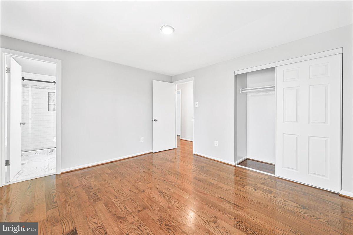 17641 Longview Lane Olney, MD 20832 - Photo 11 of 30 a view of an empty room with wooden floor
