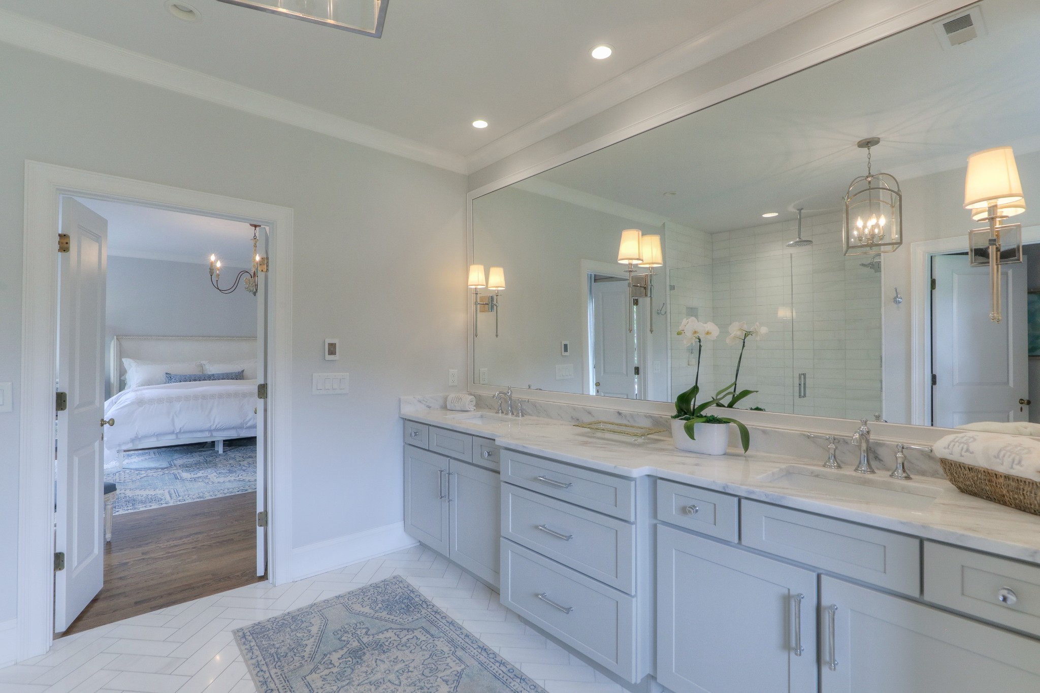 2315 Valley Brook Road Nashville, TN 37215 - Photo 19 of 67 a bathroom with a granite countertop sink mirror and shower