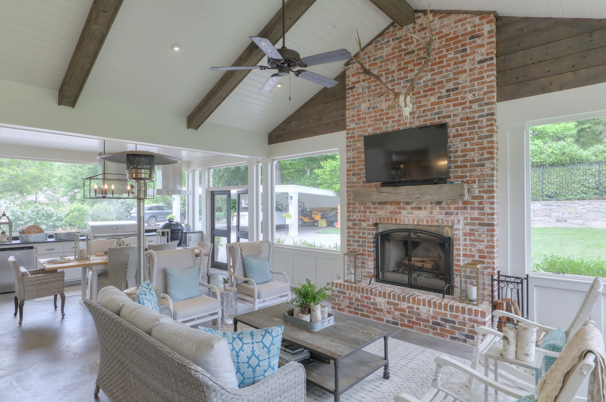 2315 Valley Brook Road Nashville, TN 37215 - Photo 25 of 67 a living room with furniture a flat screen tv and a fireplace
