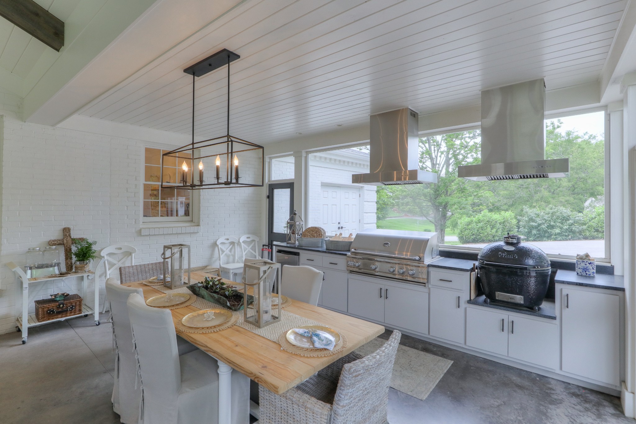 2315 Valley Brook Road Nashville, TN 37215 - Photo 27 of 67 a open dining room with stainless steel appliances granite countertop furniture window and wooden floor