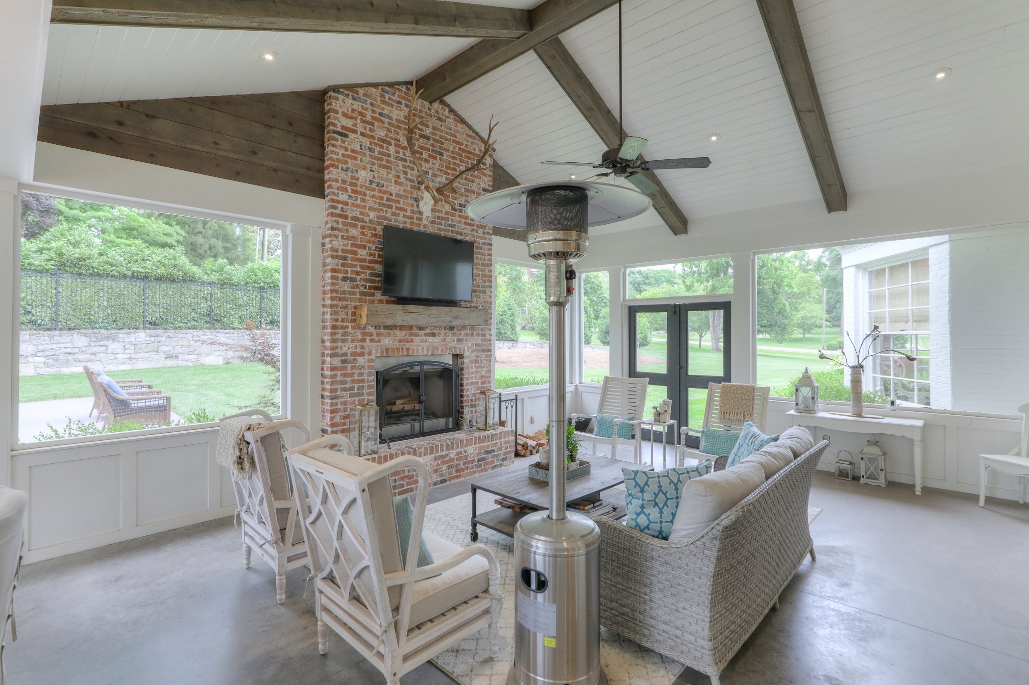 2315 Valley Brook Road Nashville, TN 37215 - Photo 29 of 67 a dining room with furniture a fireplace and wooden floor