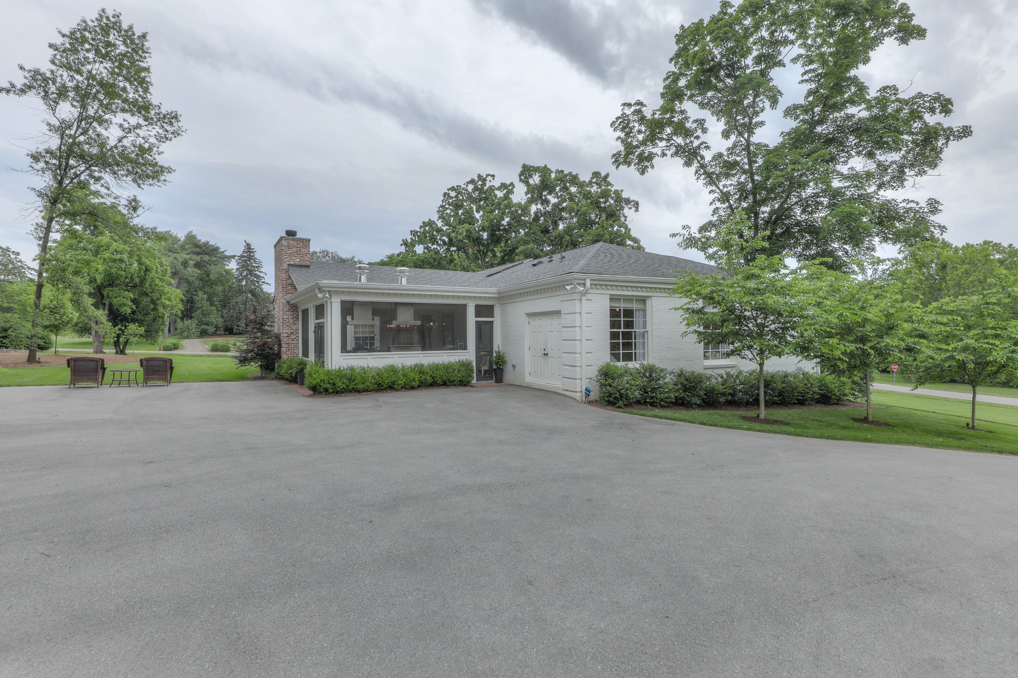 2315 Valley Brook Road Nashville, TN 37215 - Photo 31 of 67 a view of a house with a yard and large trees
