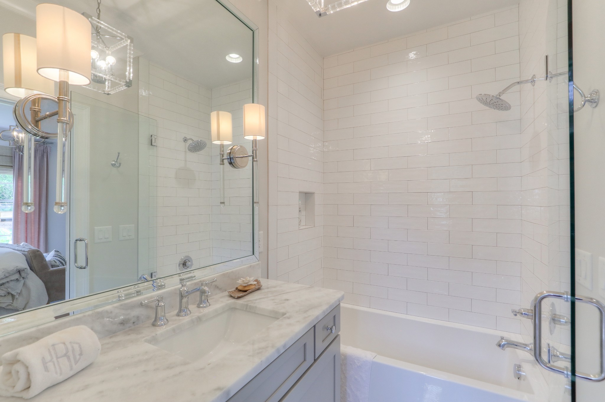 2315 Valley Brook Road Nashville, TN 37215 - Photo 35 of 67 a bathroom with a bathtub sink vanity granite and a mirror