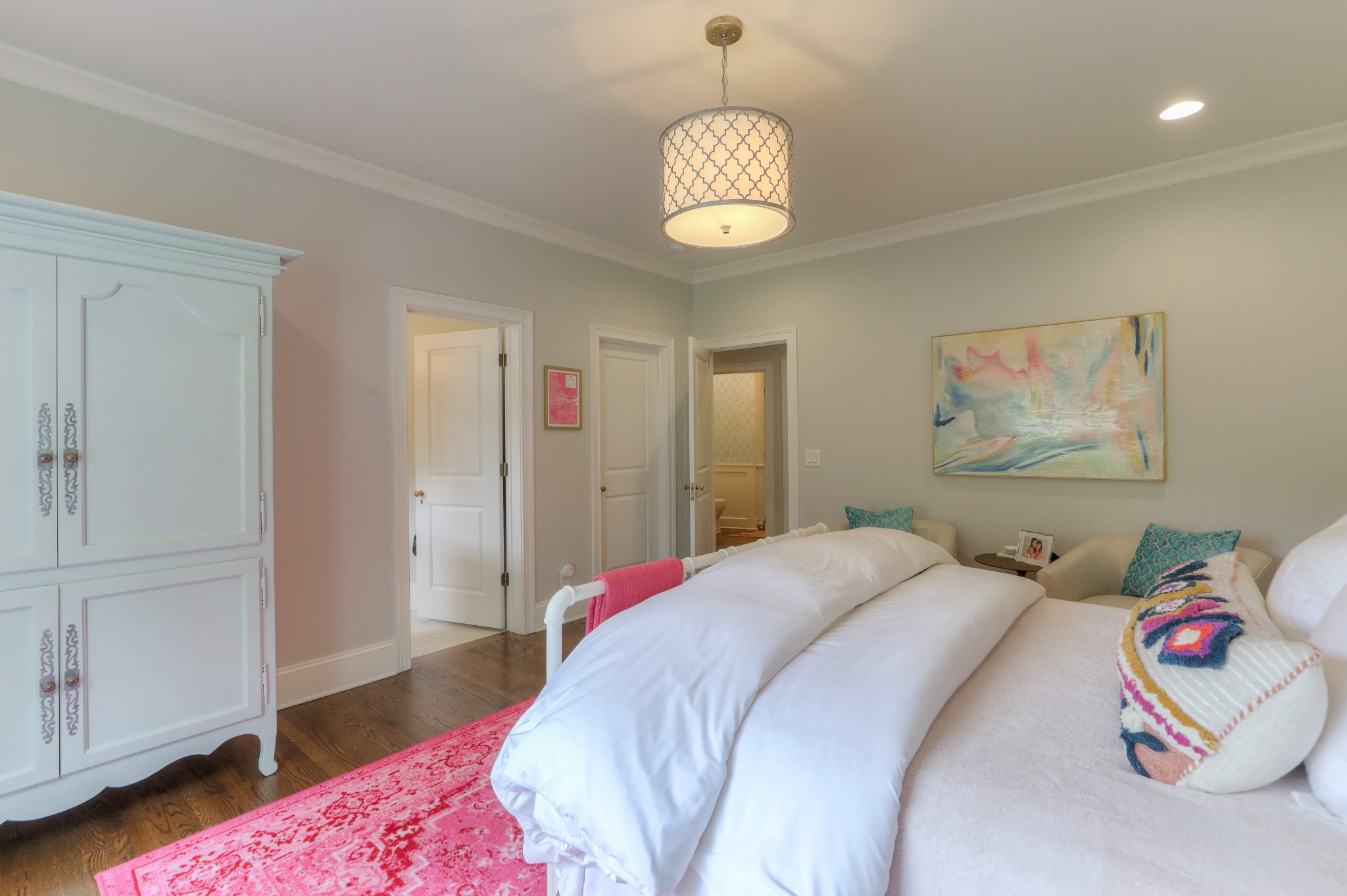 2315 Valley Brook Road Nashville, TN 37215 - Photo 40 of 67 a bedroom with a bed and a chandelier