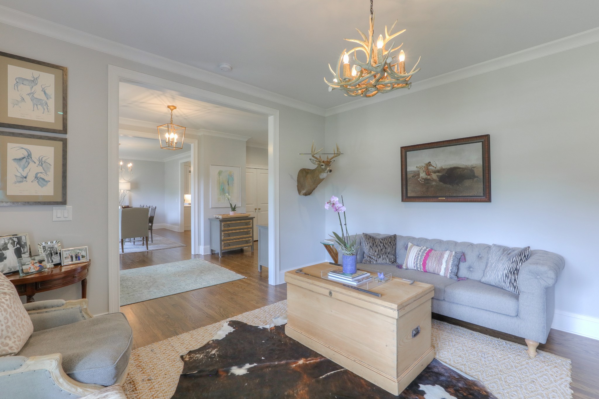 2315 Valley Brook Road Nashville, TN 37215 - Photo 50 of 67 a living room with furniture and a chandelier