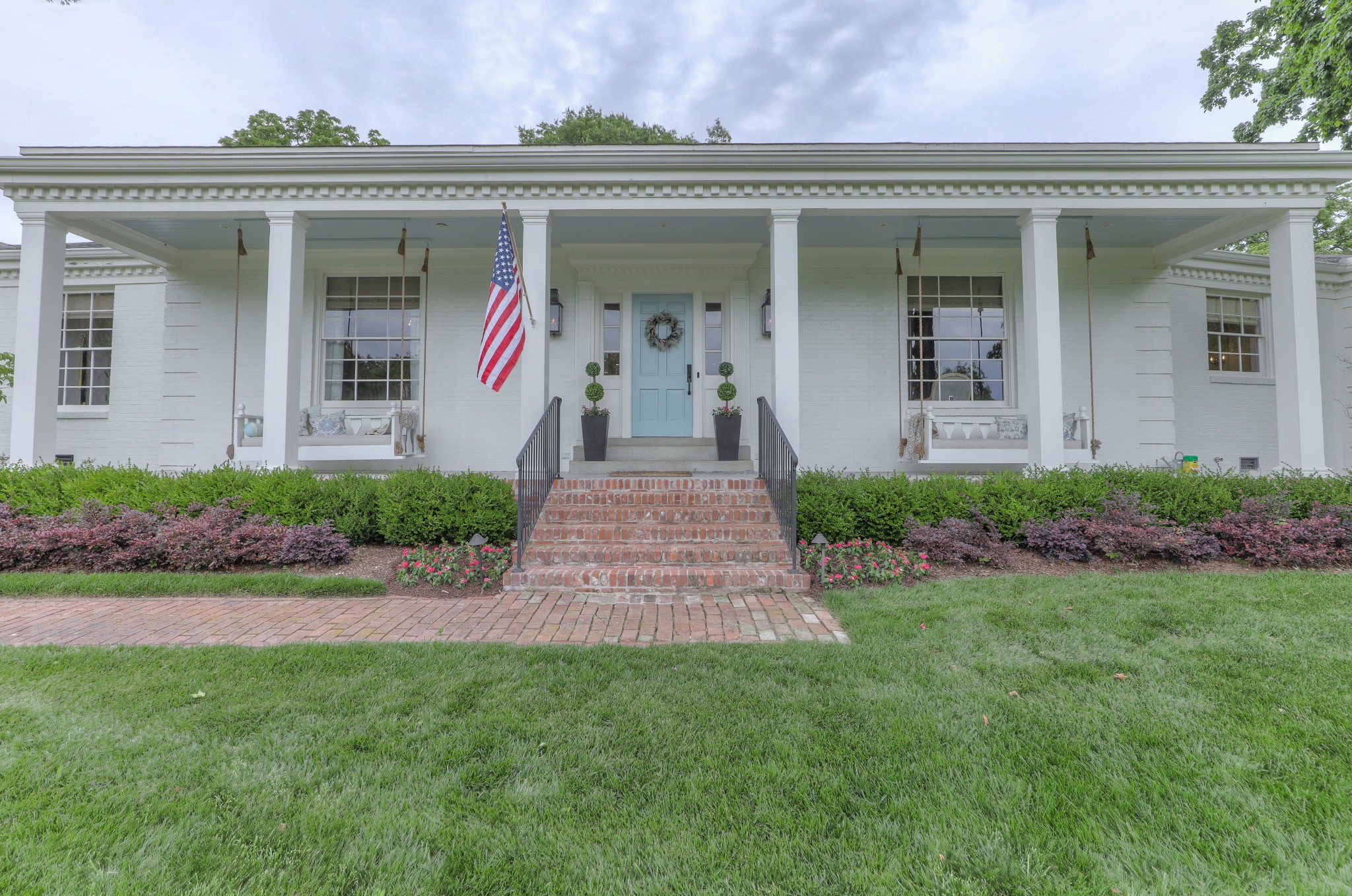 2315 Valley Brook Road Nashville, TN 37215 - Photo 5 of 67 a front view of a house with garden