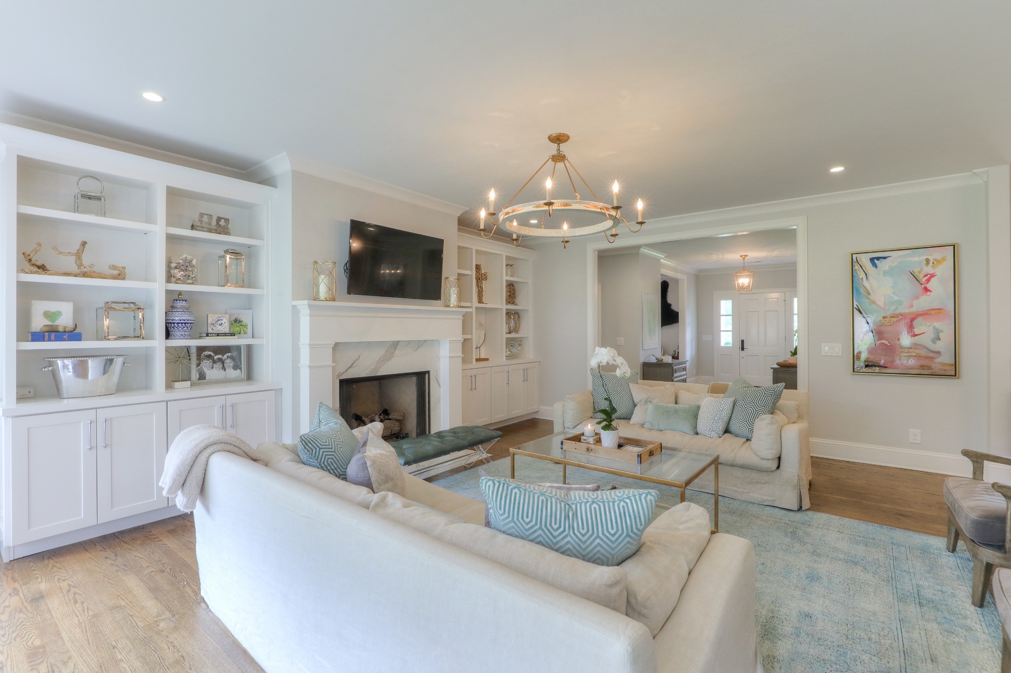 2315 Valley Brook Road Nashville, TN 37215 - Photo 52 of 67 a living room with furniture a fireplace and a flat screen tv