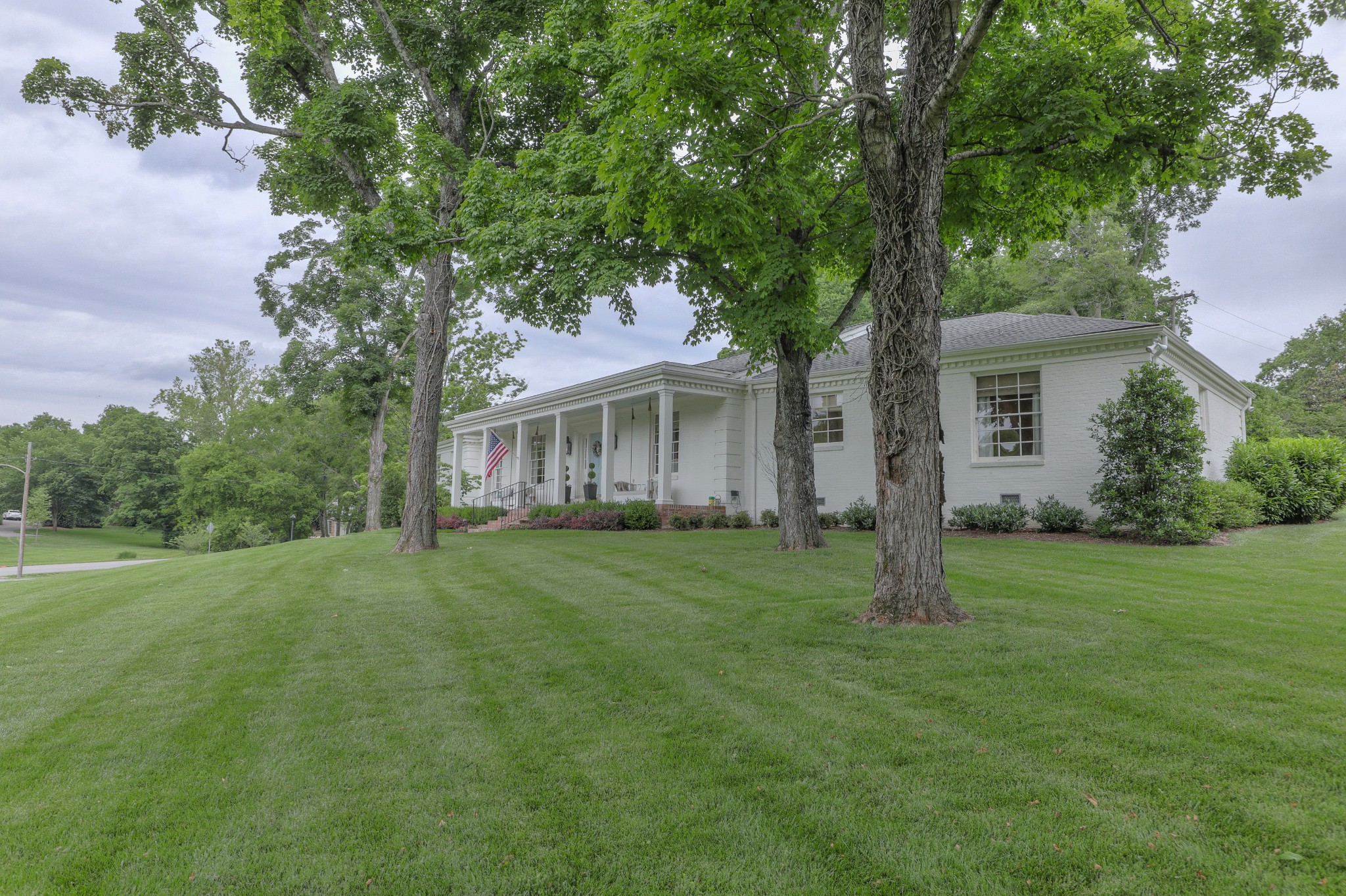 2315 Valley Brook Road Nashville, TN 37215 - Photo 54 of 67 a view of a house with a big yard and large trees