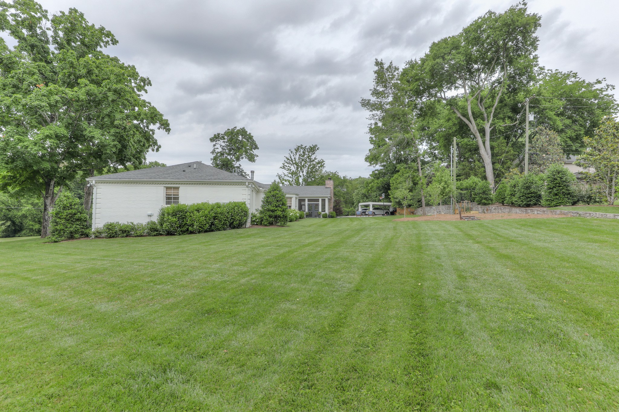 2315 Valley Brook Road Nashville, TN 37215 - Photo 65 of 67 a view of a house with a big yard and a large tree