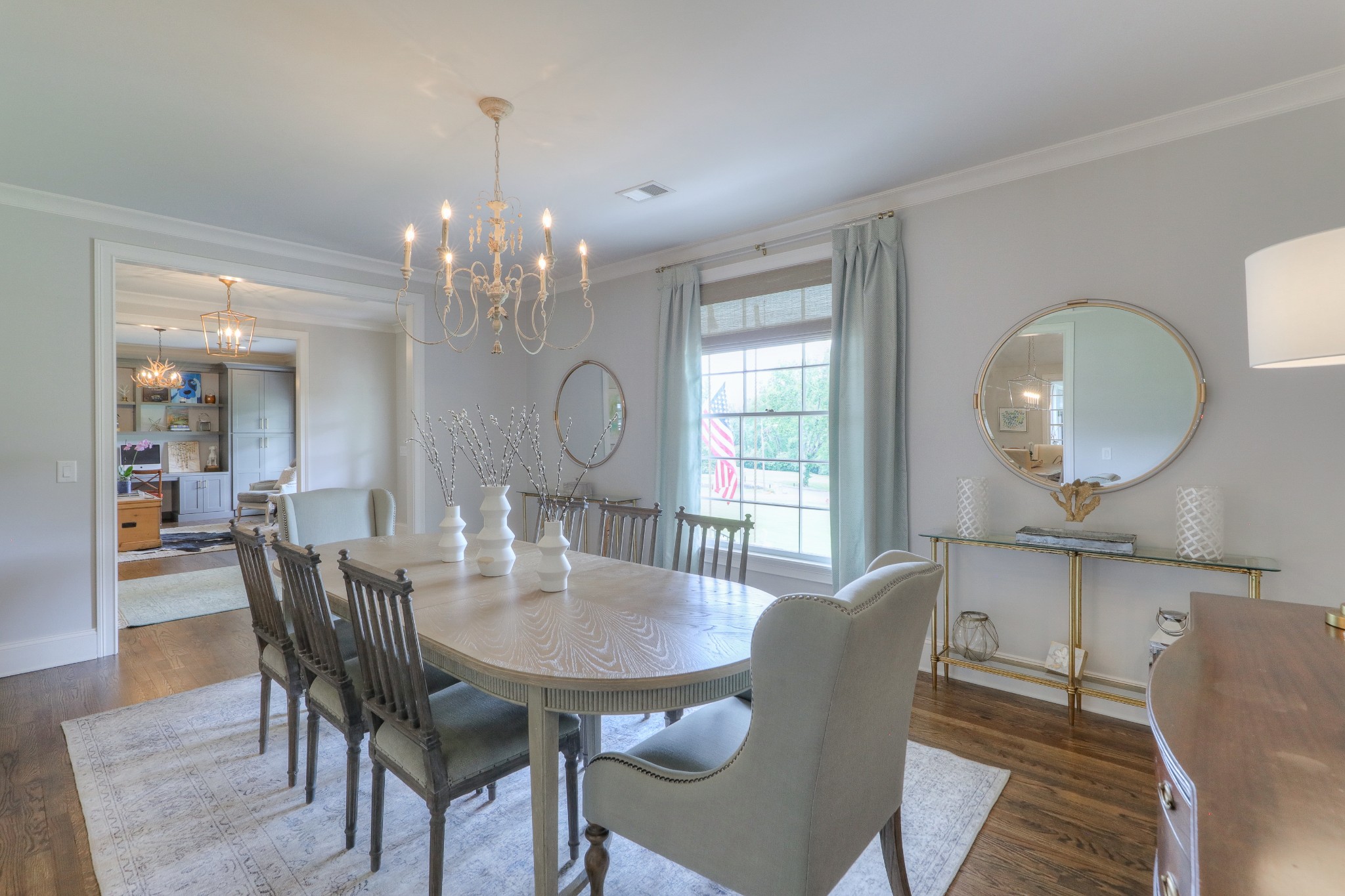 2315 Valley Brook Road Nashville, TN 37215 - Photo 10 of 67 a view of a dining room with furniture a chandelier and wooden floor