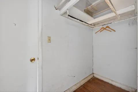 a bathroom with a toilet and a bathtub