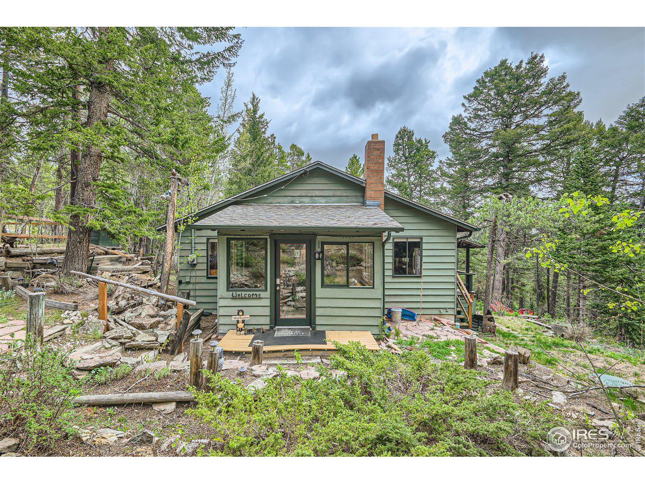 252 Upper Travis Gulch Road Black Hawk, CO 80422 - Photo 1 of 30 Cozy Mountain Charm