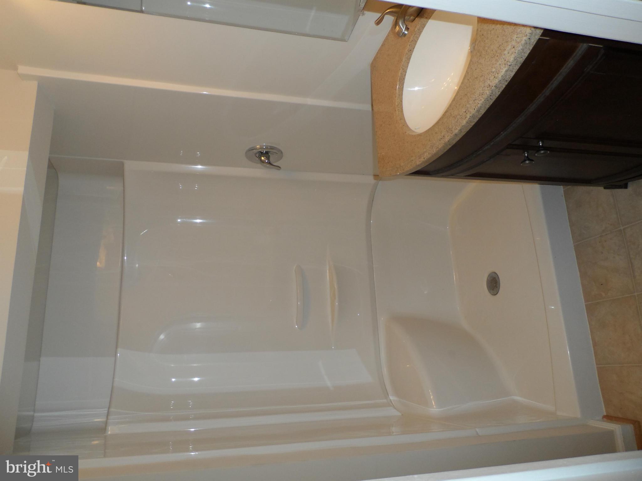 147 Deacon Road Fredericksburg, VA 22405 - Photo 12 of 16 a bathroom with a shower