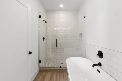 a bathroom with a sink and a shower