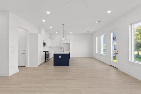 a view of kitchen and windows