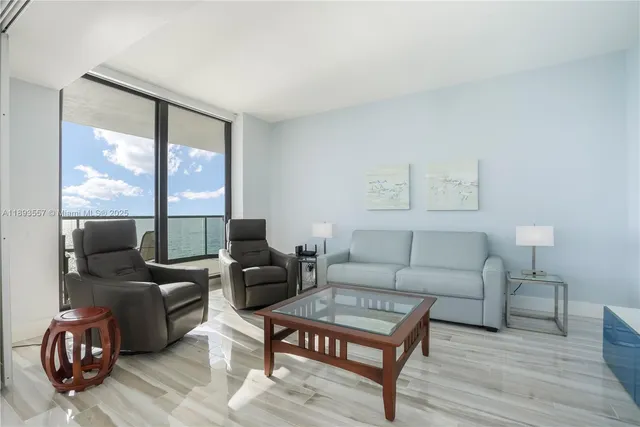 a bedroom with a bed and a mirror