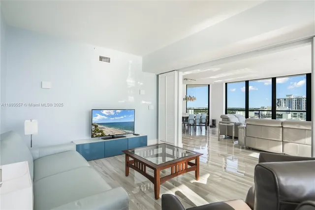 a spacious bathroom with a double vanity sink a mirror and a shower
